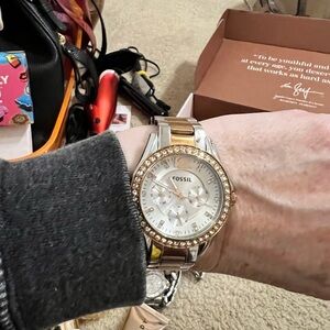 Fossil Copper and Stainless women’s watch with diamond bezel.